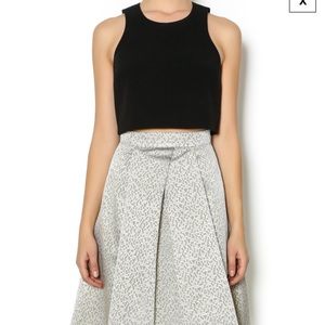 Black Halo black crop top and gold Minya skirt.